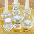 Reversible ribbed clear glass candlestick holders in three heights — alternate view
