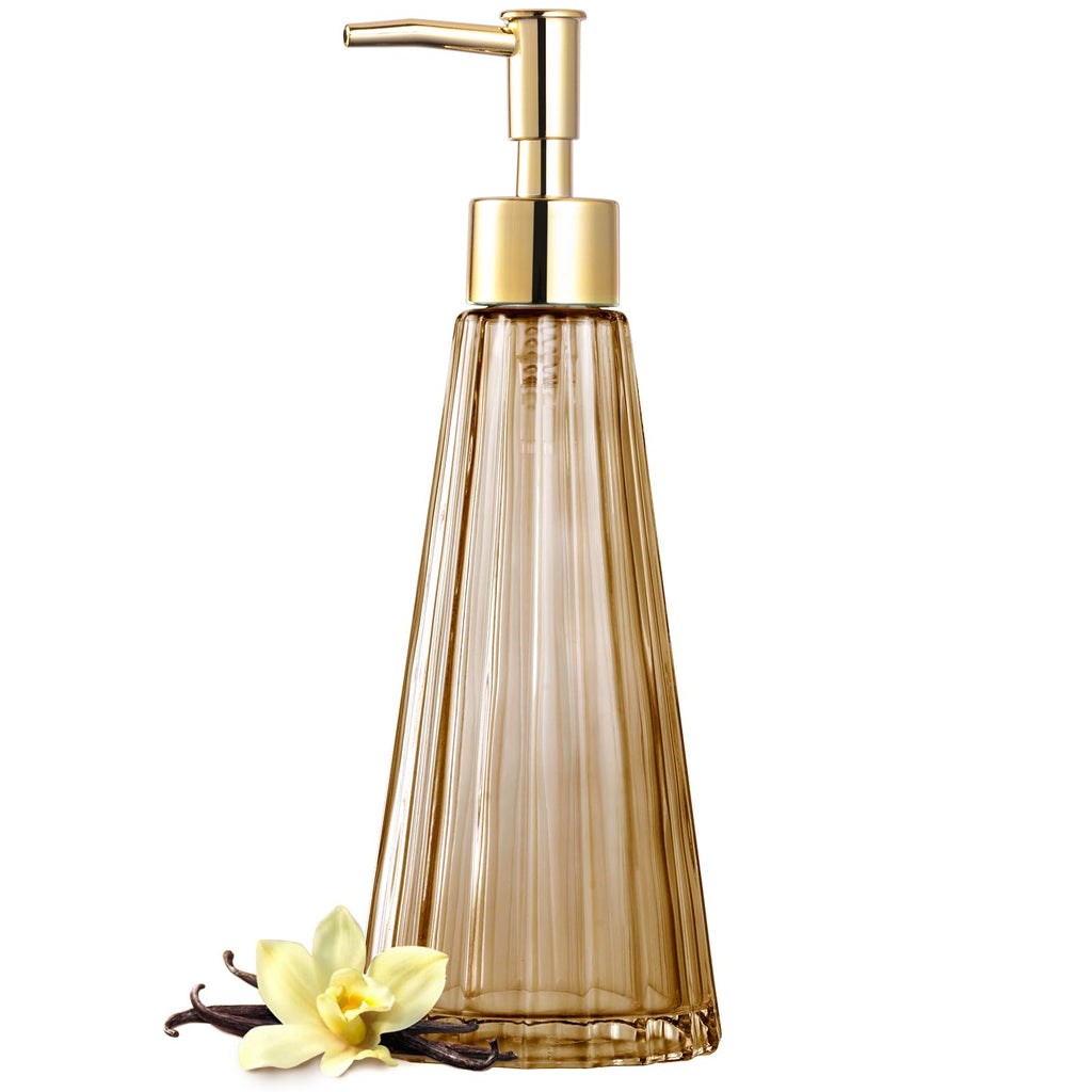 Vintage amber glass soap dispenser with pump on a bathroom counter — alternate view
