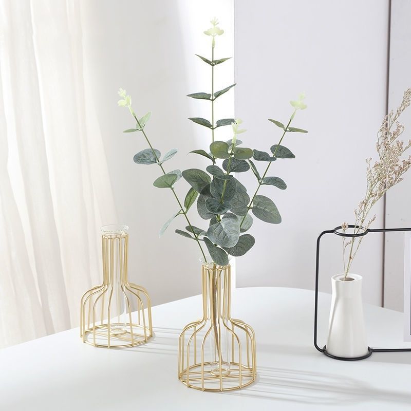 Geometric iron bud vase with glass test tube insert holding a single stem — view 7