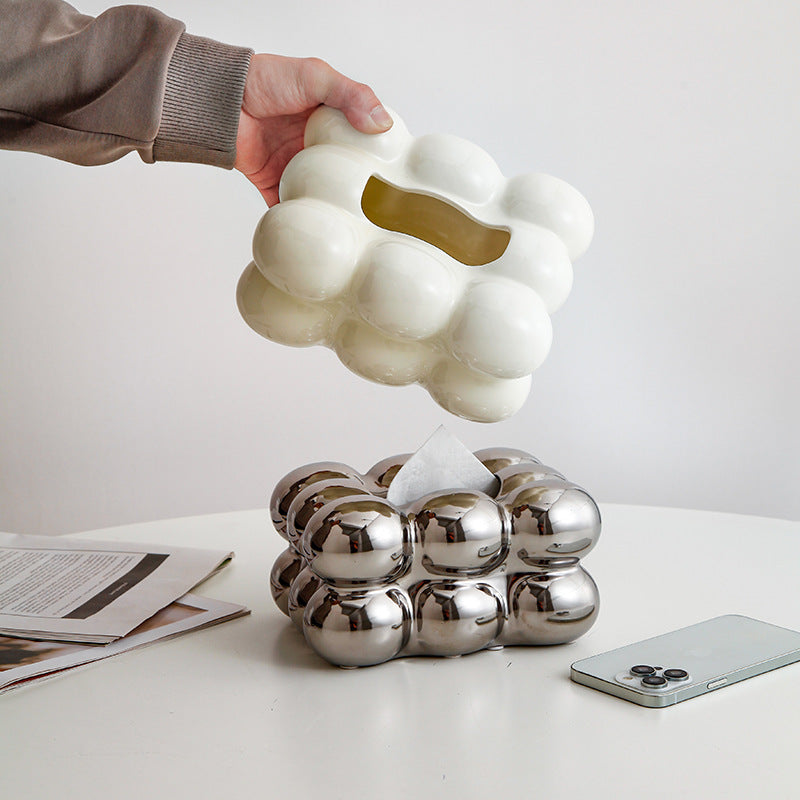 Sculptural ceramic tissue box with soft electroplated finish — scale view