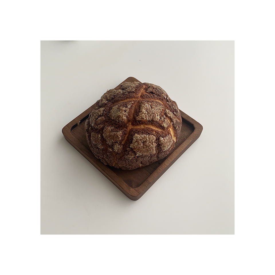 Solid walnut wood coasters with natural grain on a table — view 7
