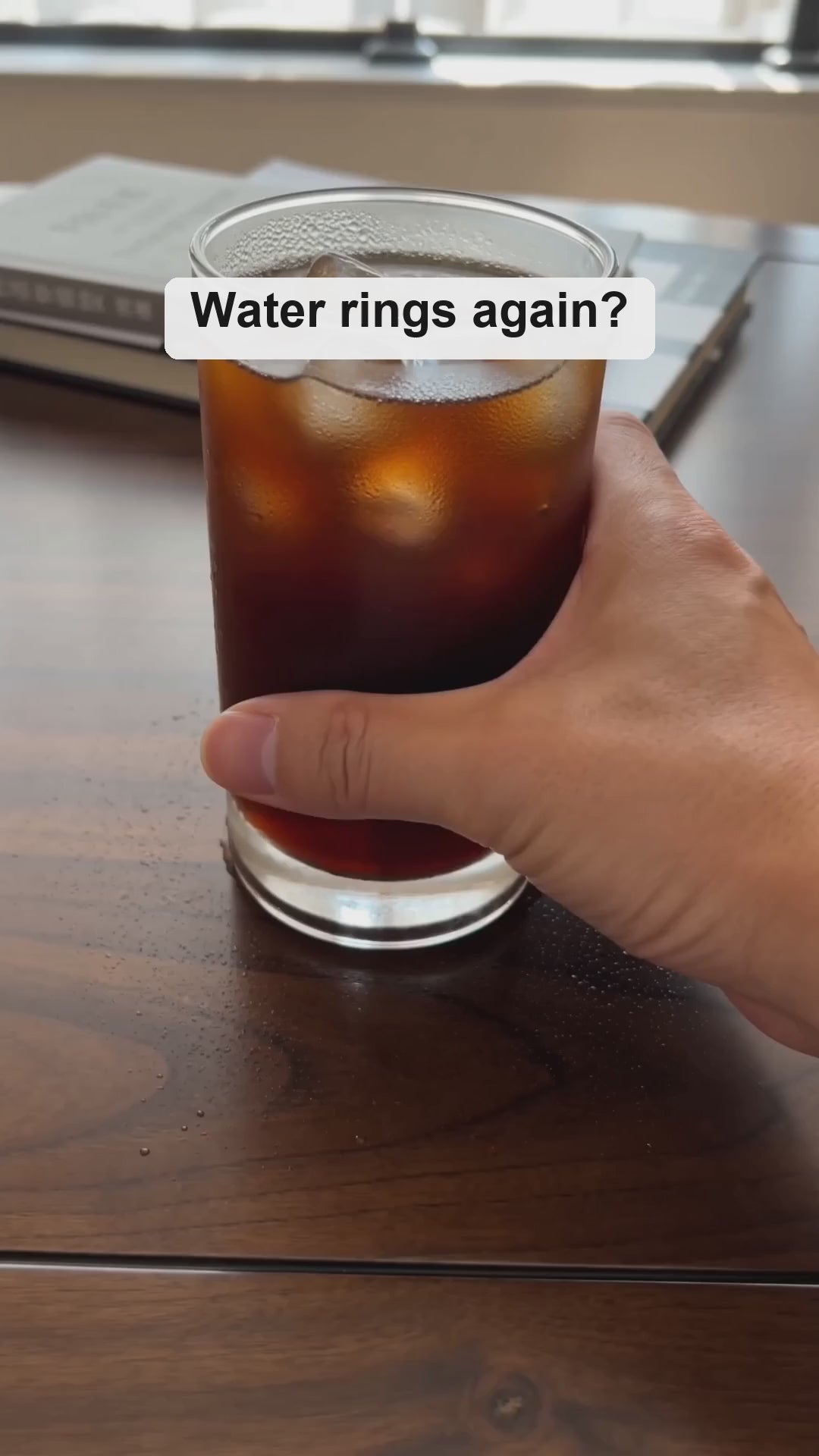 Natural travertine stone coaster in use: a cold glass set down on the stone