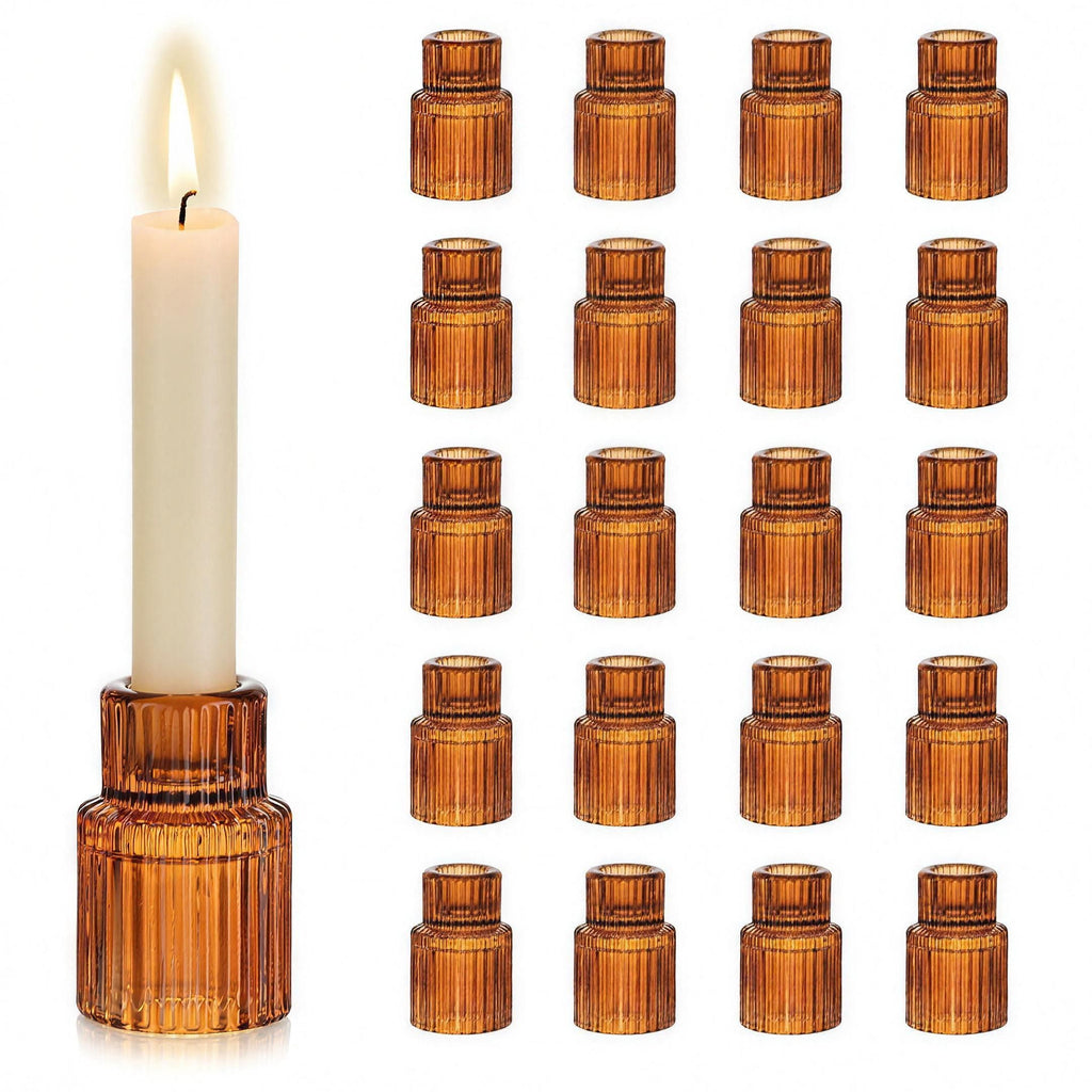 Amber ribbed glass taper candle holders set on a dinner table