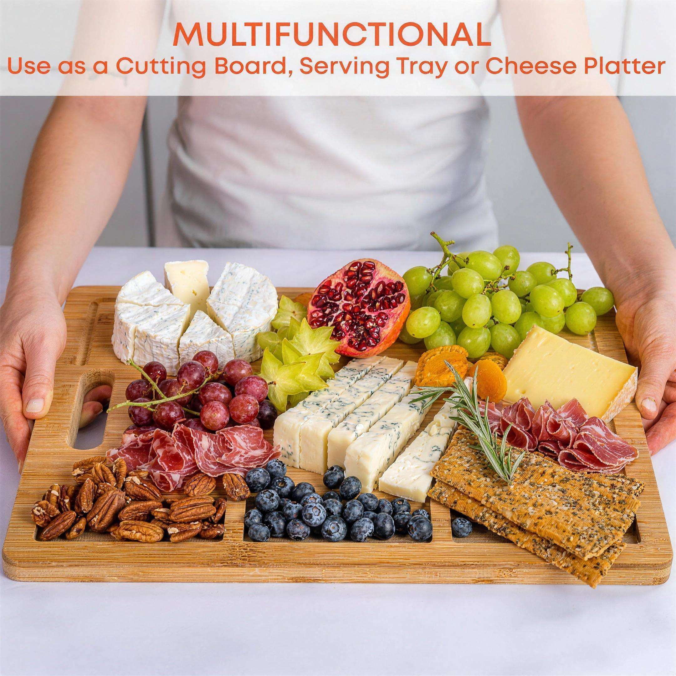 Extra-large bamboo cutting and serving board with juice groove and compartments — in use