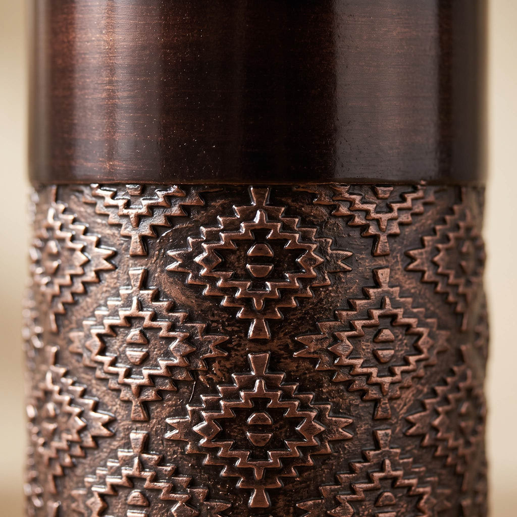 Faceted ceramic vase detail showing the diamond glazed surface catching light