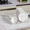 Minimalist stainless steel dish rack on kitchen counter — alternate view